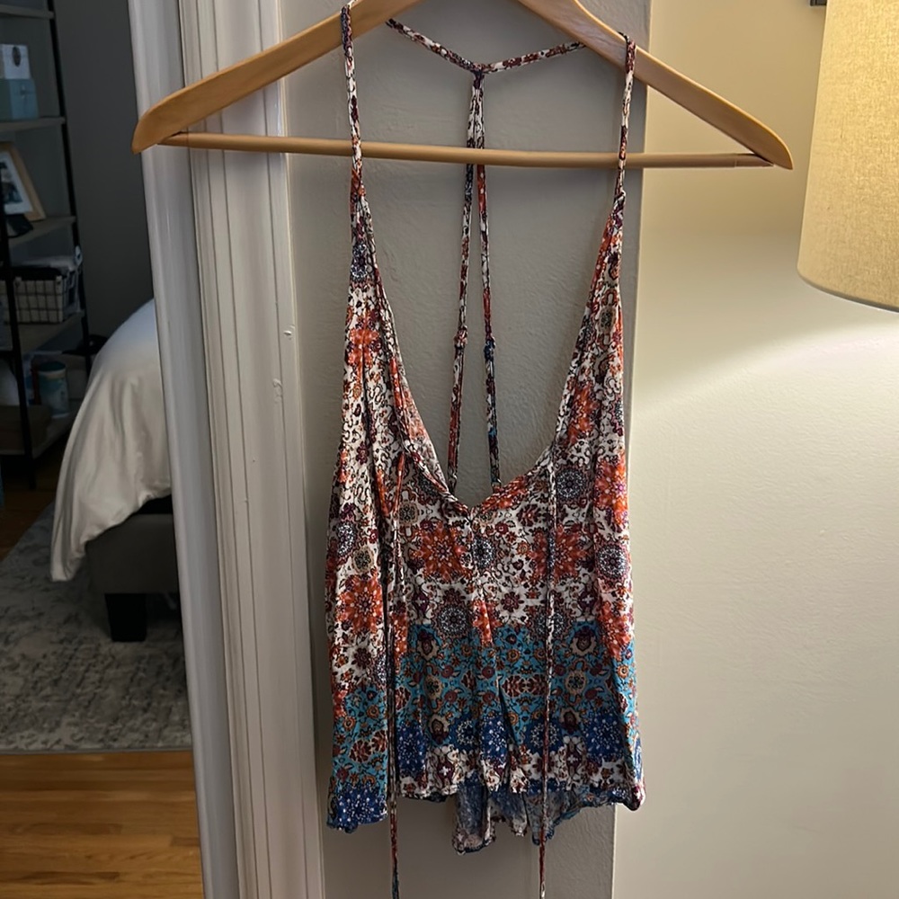 Floral blouse size medium runs small